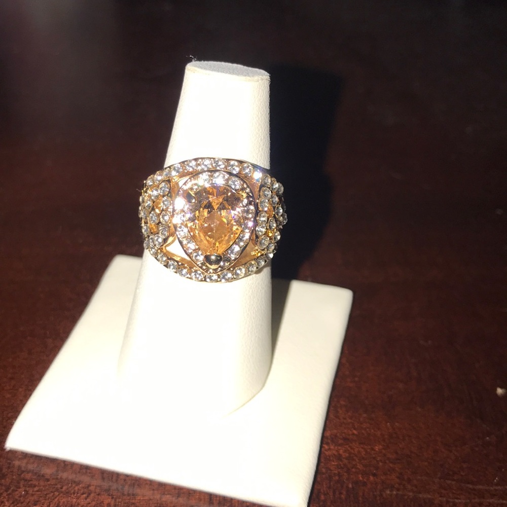 Gold ring with orange Centerstone